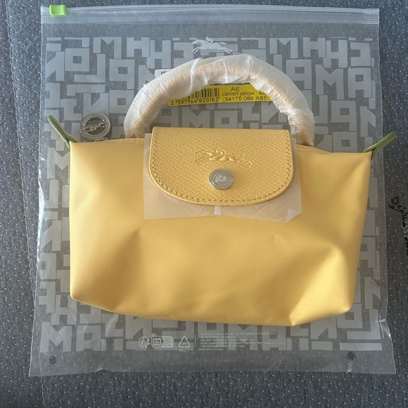 Longchamp Handbags - Longchamp Le Pliage Women's Yellow Canvas Mini
Shoulder Bag